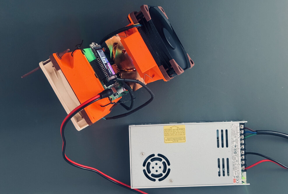 NerdQaxe++ with two 120mm Noctua fans and a Mean Well LRS-350-12 PSU