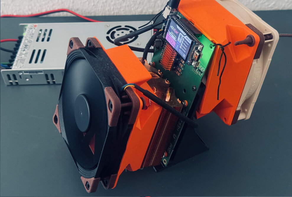 NerdQaxe++ with two 120mm Noctua fans and a Mean Well LRS-350-12 PSU